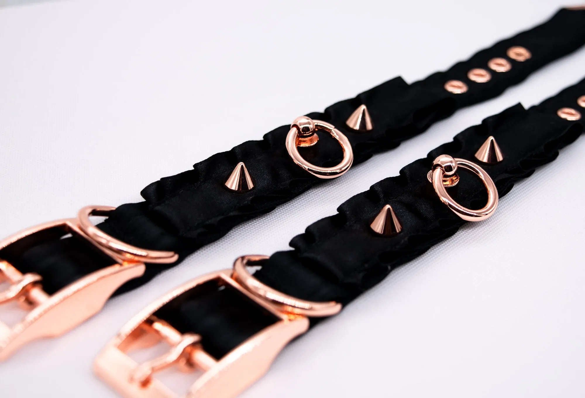 Black O-Ring BDSM Cuffs in Rose Gold