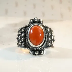 Fiery Red Coral in Ornate Silver Ring