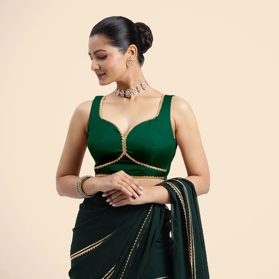 Ishika x Tyohaar | Bottle Green Sleeveless FlexiFit™ Saree Blouse with Beetle Leaf Neckline with Golden Gota Lace and Back Cut-out with Tie-Up